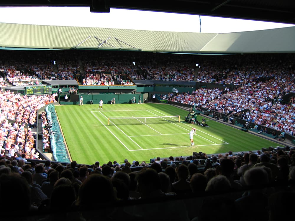 Grass tennis court and grandstands at Wimbledon